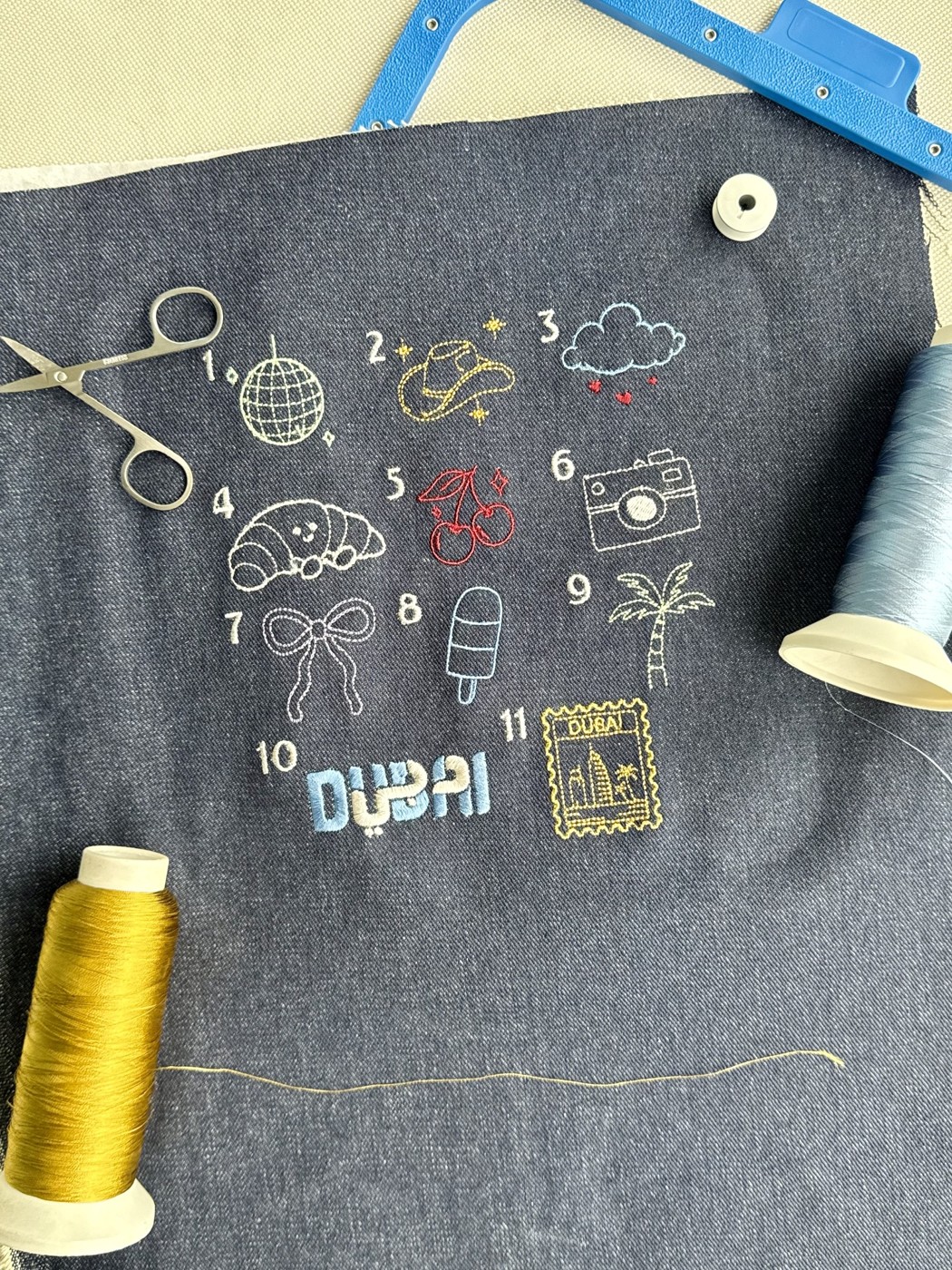 Lunaloom denim embroidery menu featuring Dubai motifs and colourful thread